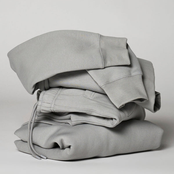 Pile of soft high quality cotton joggers and hoodies